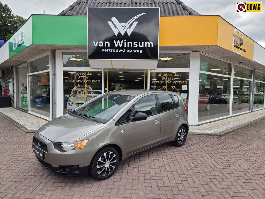 Mitsubishi Colt 1.1 ClearTec Edition One | Airco | Trekhaak, Auto's, Mitsubishi, Euro 5, Stof, Gebruikt, Metallic lak
