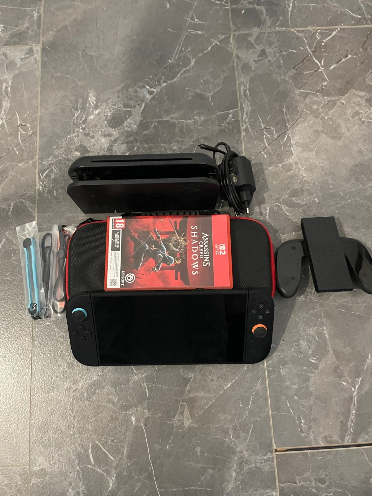 Nintendo Switch 2 met Assassin's Creed Shadows, Spelcomputers en Games, Met games, Met 2 controllers, Zo goed als nieuw, Switch OLED