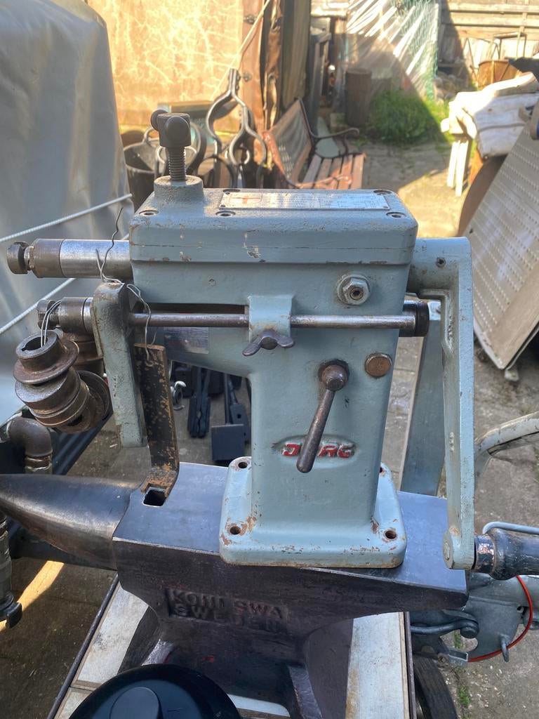Kraalmachine met verschillende hulpstukken, Ophalen