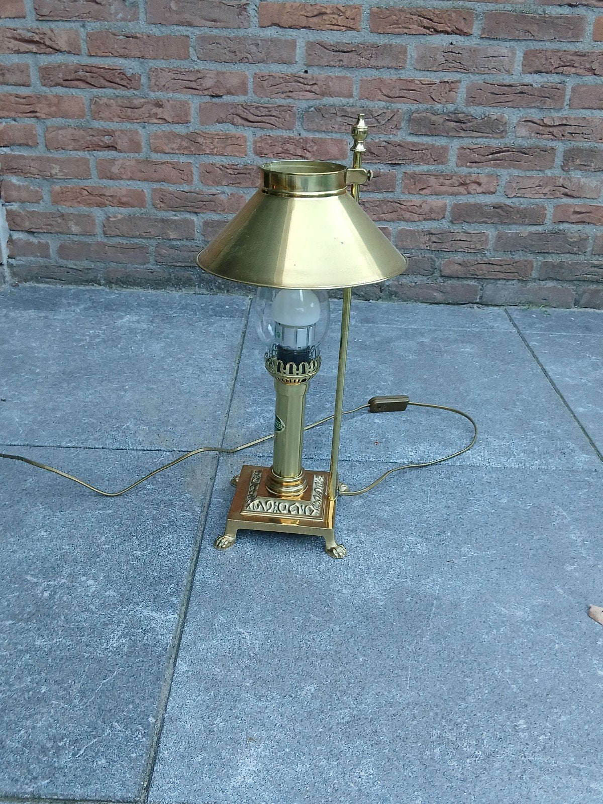 Koperen lamp, Ophalen