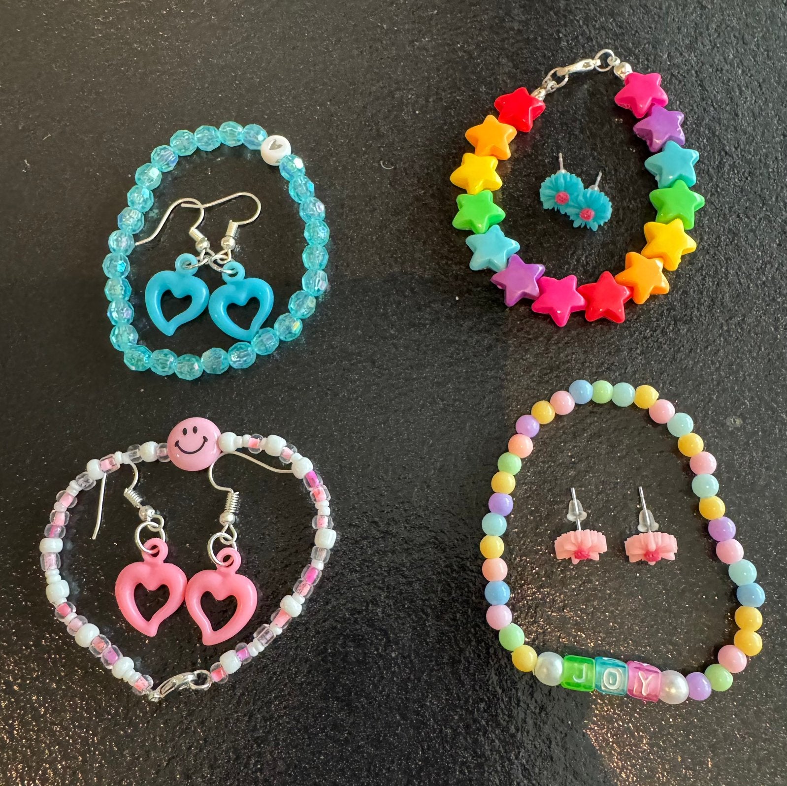 Nieuw kindersieraden armband + oorbellen 2 sets voor 3,50, Ophalen of Verzenden, Nieuw, Overige kleuren, Armband
