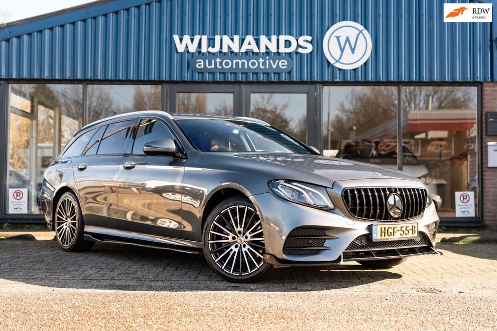 Mercedes-Benz E-klasse Estate 200 4MATIC Automaat Volledig O, Auto's, Mercedes-Benz, 4 cilinders, Parkeerassistent, Leder en Stof