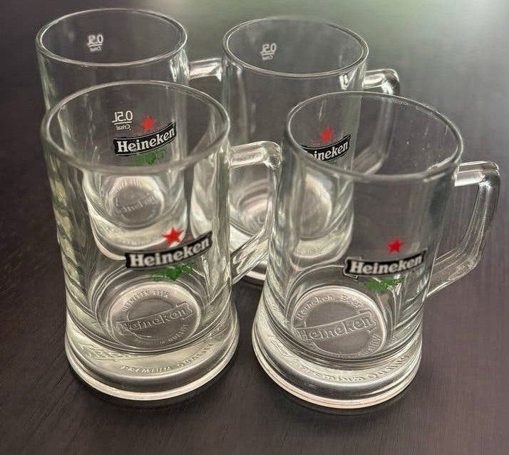 Set van 4 Heineken Bierpul 0.5 Liter, Ophalen of Verzenden, Zo goed als nieuw, Meerkleurig, Glas