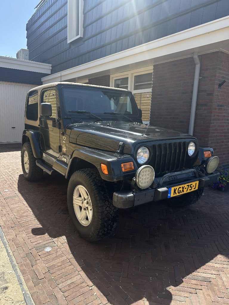 Jeep Wrangler 4.0i TJ - SAHARA - ROESTVRIJ - APK+GR ONDRHD, Auto's, 4 stoelen, Leder en Stof, Zwart, 3960 cc