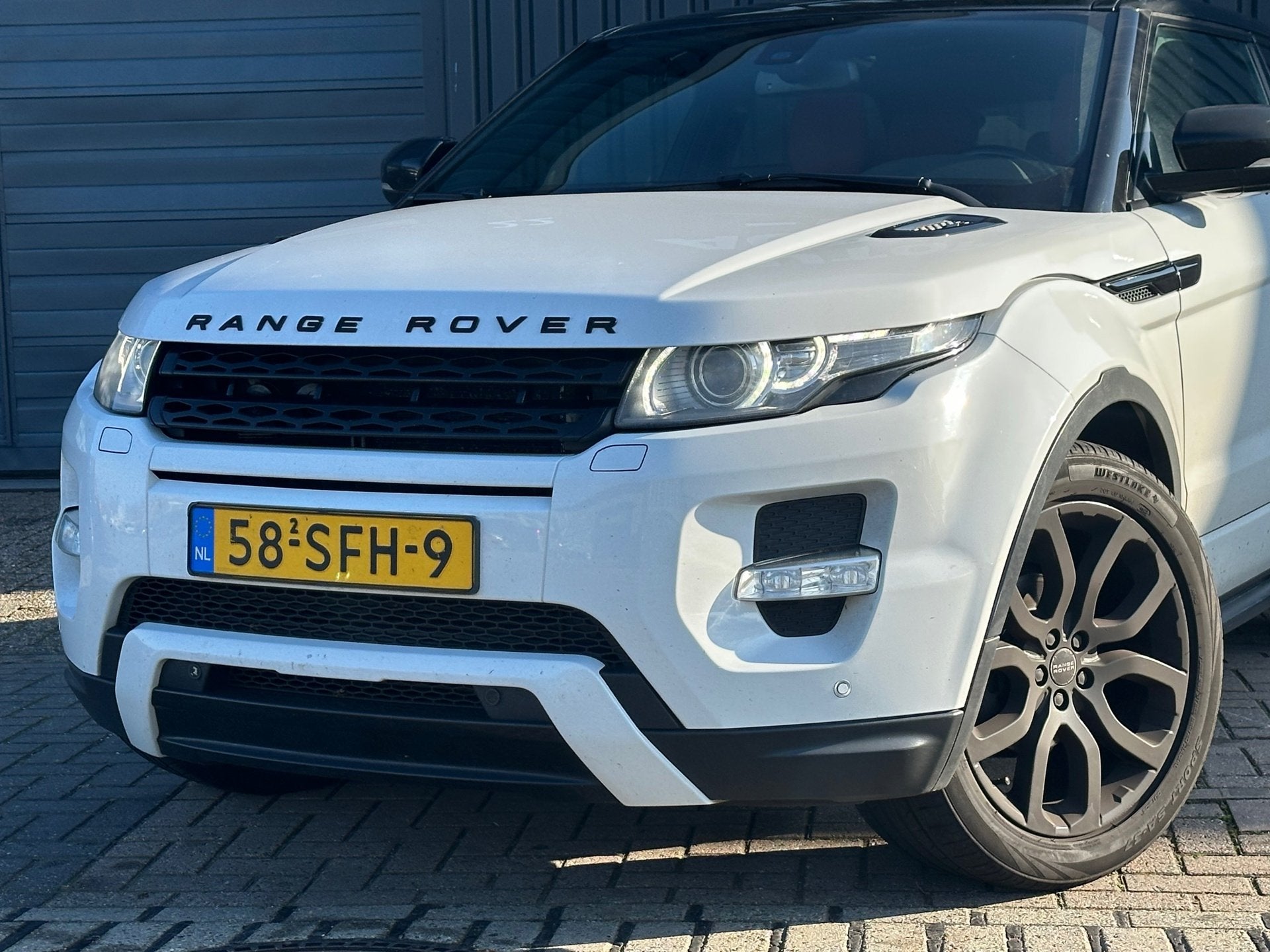 Land Rover Range Rover Evoque Coupé 2.0 Si 4WD Prestige PAN, Auto's, Automaat, Euro 5, 4 cilinders, 4 stoelen