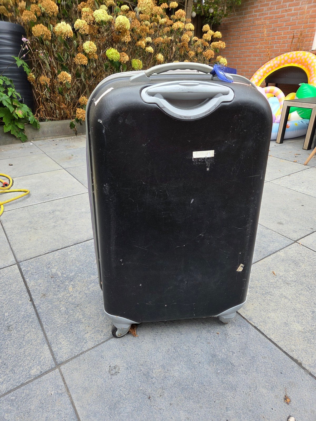 Gebruikte zwarte koffer met wieltjes en uitschuifbare gre, Ophalen, Wieltjes, Gebruikt, 20 tot 30 cm