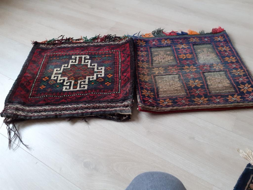 Perzische kussenhoezen en kleedjes, Ophalen
