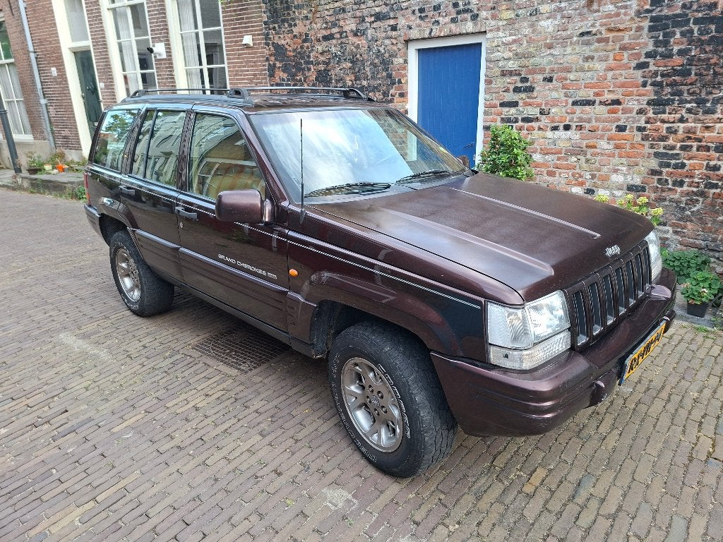 Jeep Grand Cherokee 4.0 I AUT 4WD 1997 Roodbruin, Beige, Stoelverwarming, Vierwielaandrijving, Particulier