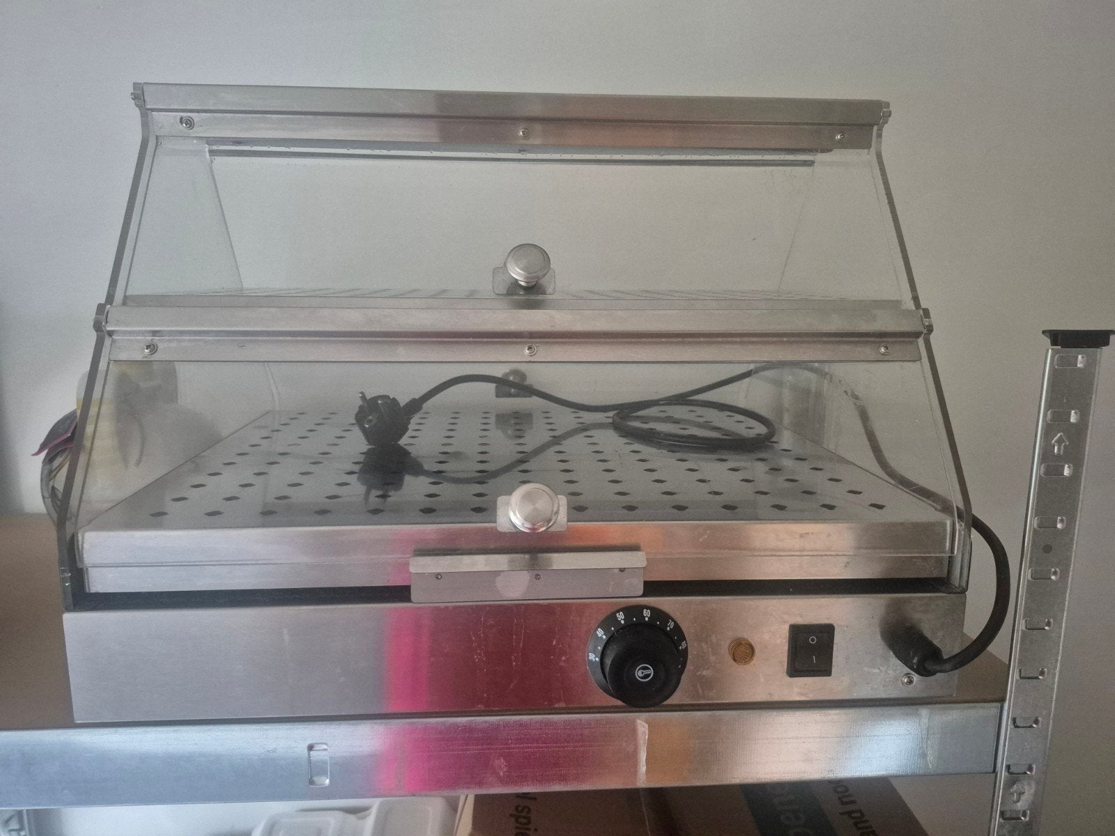 Warmhoud vitrine, Ophalen