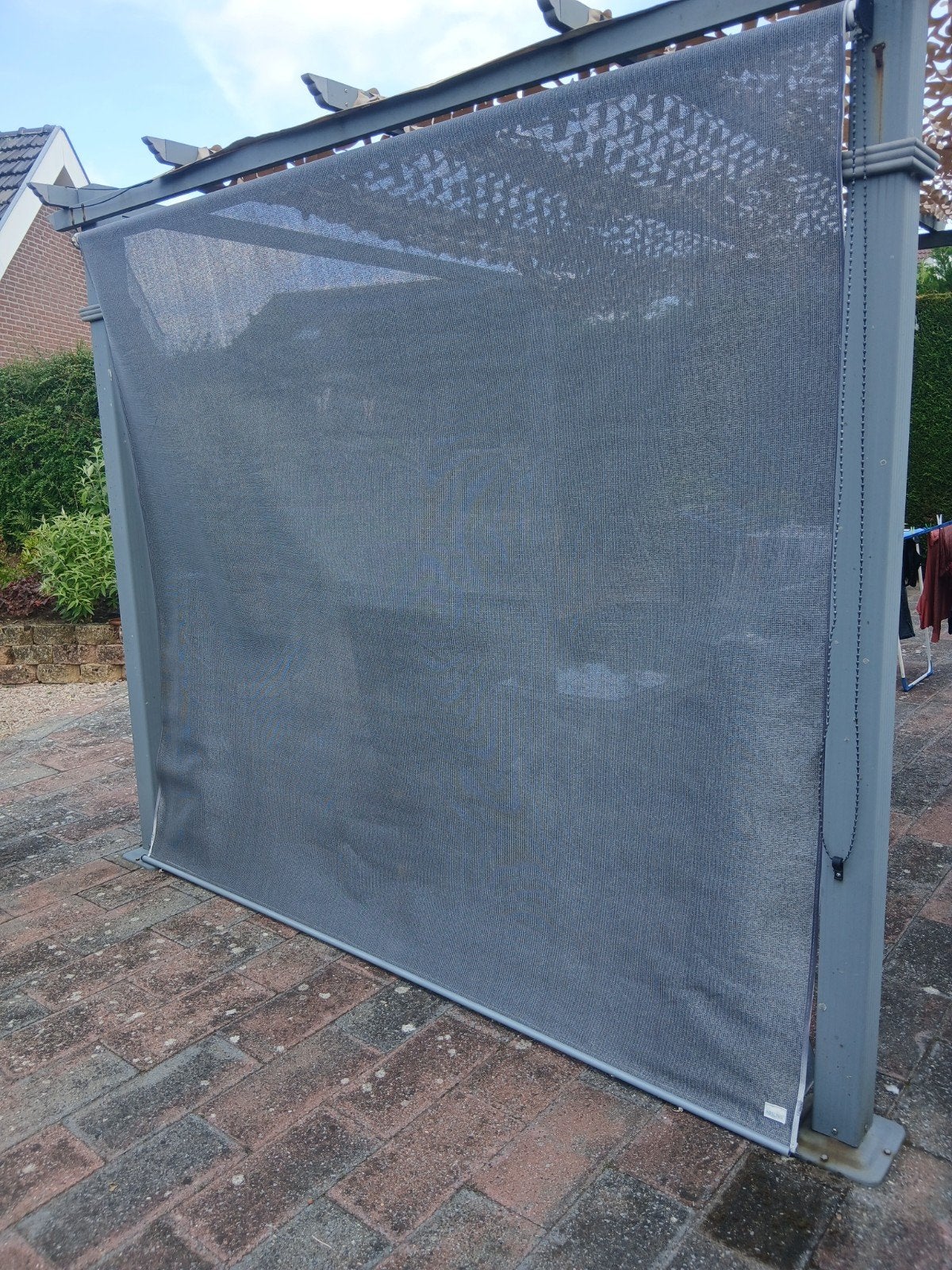 Nesling zonne doek/screen, Ophalen
