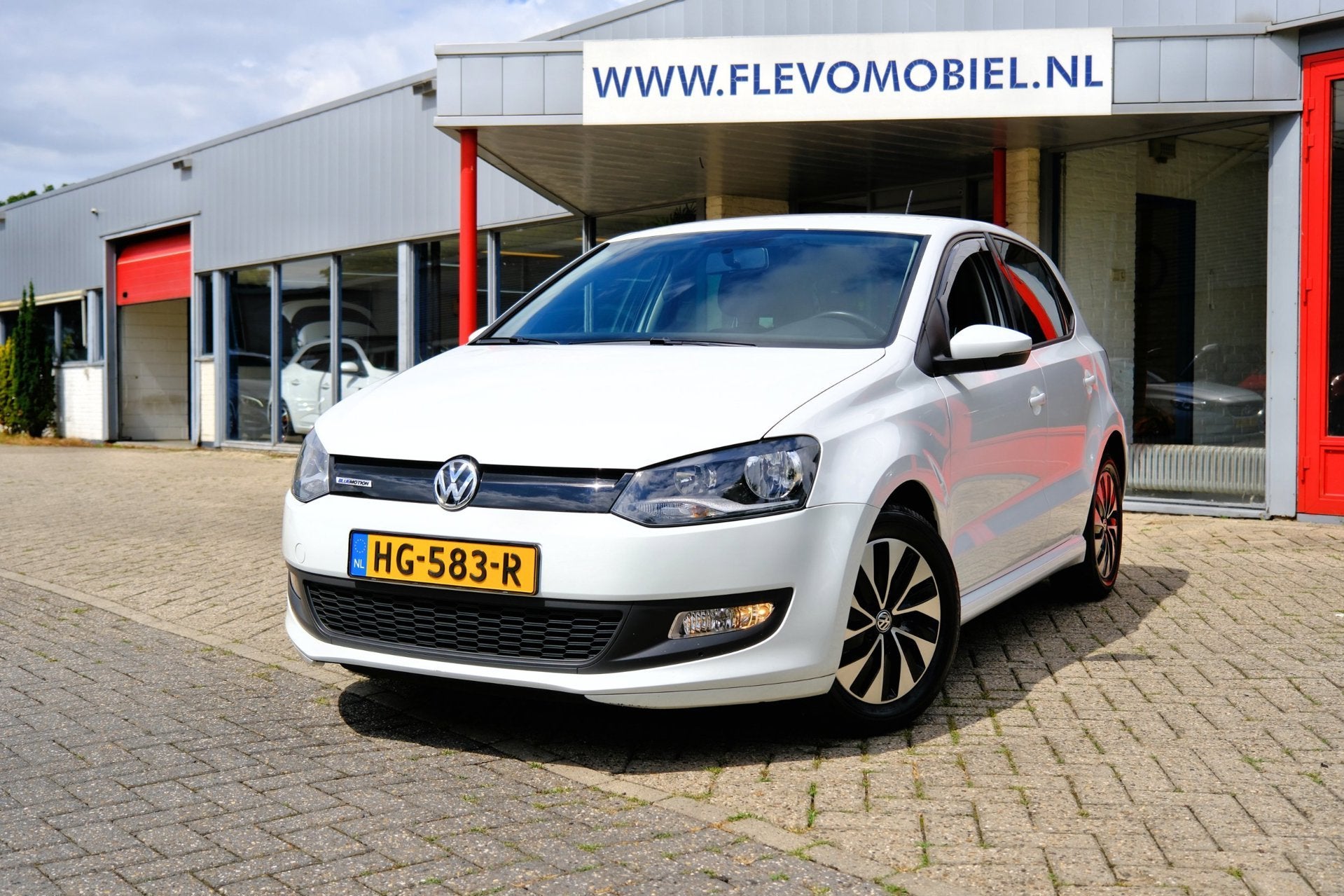 Volkswagen Polo 1.0 BlueMotion Edition 5-drs *29.130km!* Nav, Auto's, Voorwielaandrijving, Stof, 95 pk, Wit
