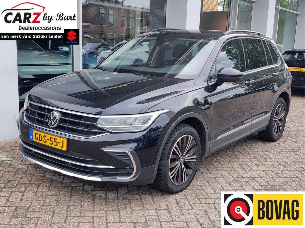 Volkswagen Tiguan 1.5 TSI ELEGANCE DSG Winterpakket | Adapti, Auto's, Volkswagen, 15 km/l, 4 cilinders, Zwart, Bedrijf