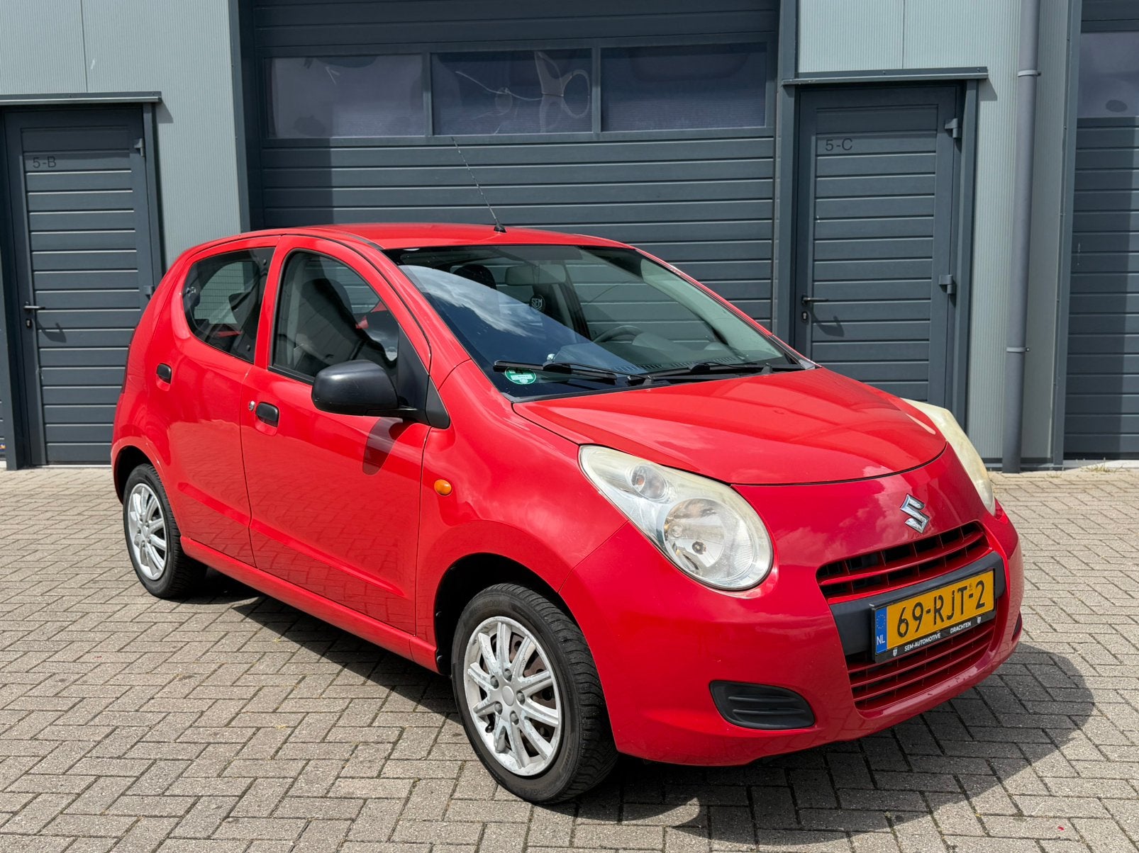 Suzuki Alto 1.0 2011 Rood | 5 deurs | Nieuwe APK! |, Voorwielaandrijving, Stof, Origineel Nederlands, Bedrijf