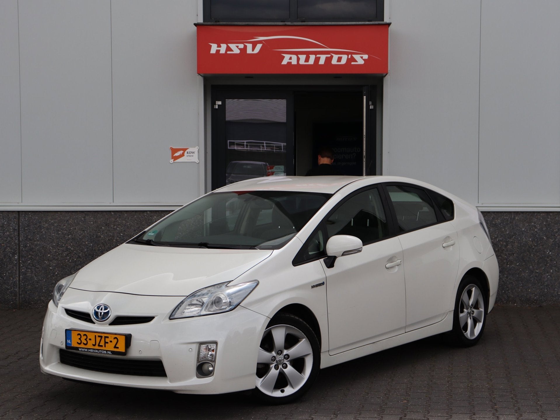 Toyota Prius 1.8 Aspiration navi LM airco, Gebruikt, 4 cilinders, Wit, Origineel Nederlands