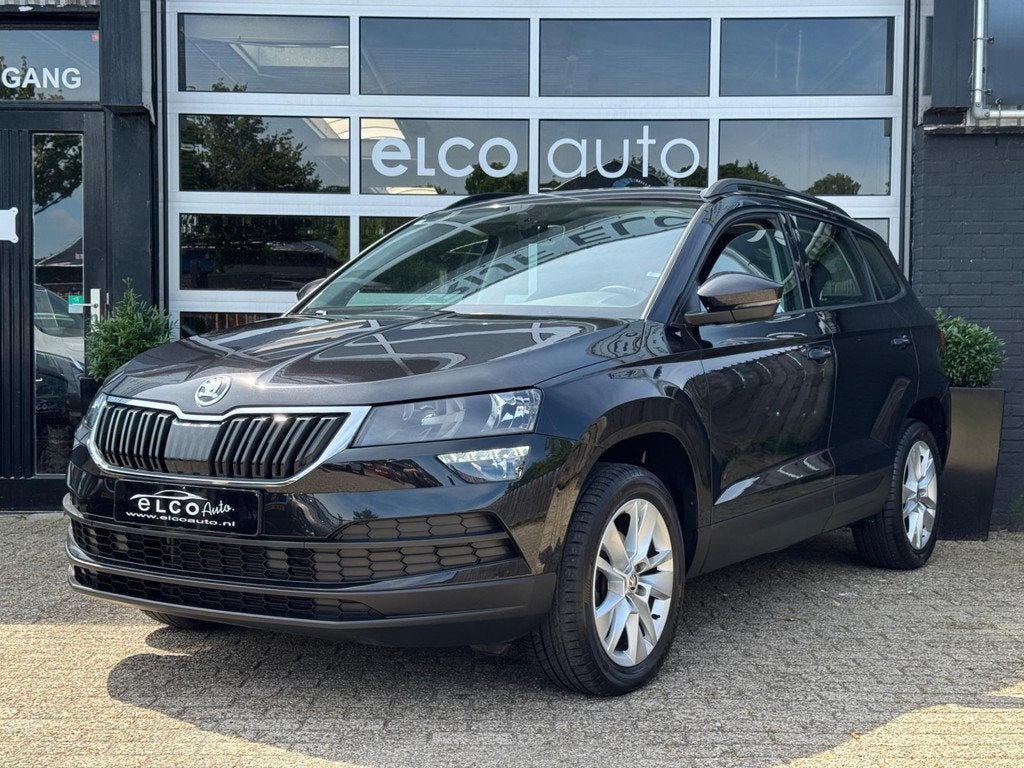 Skoda Karoq 1.5 TSI ACT Ambition Business / CarPlay, Auto's, Skoda, Lichtsensor, Stof, Zwart, 4 cilinders