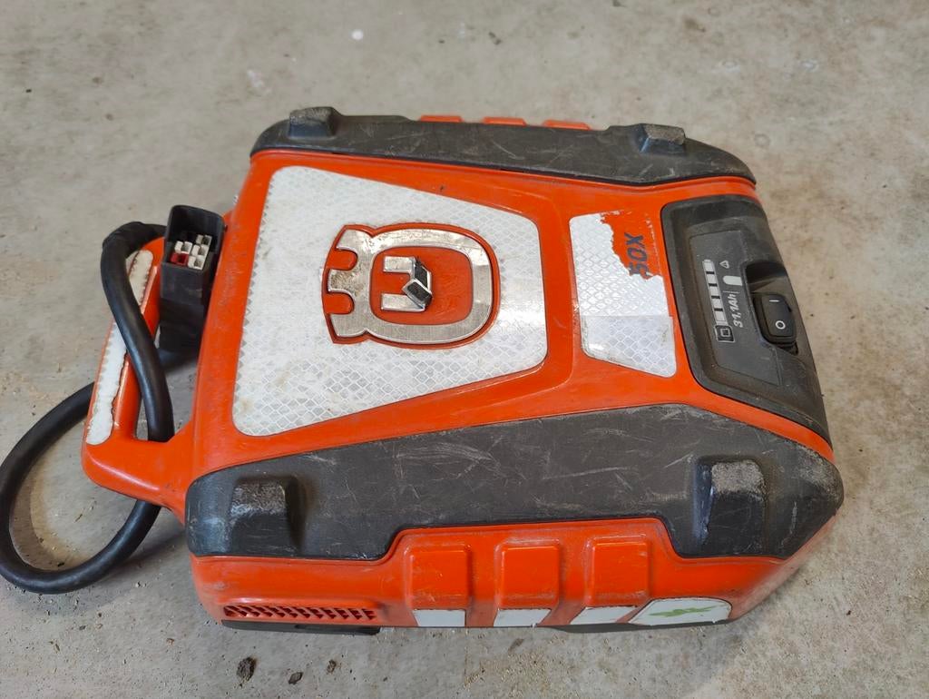 Husqvarna BLI950 rug gedragen accu met lader, Ophalen