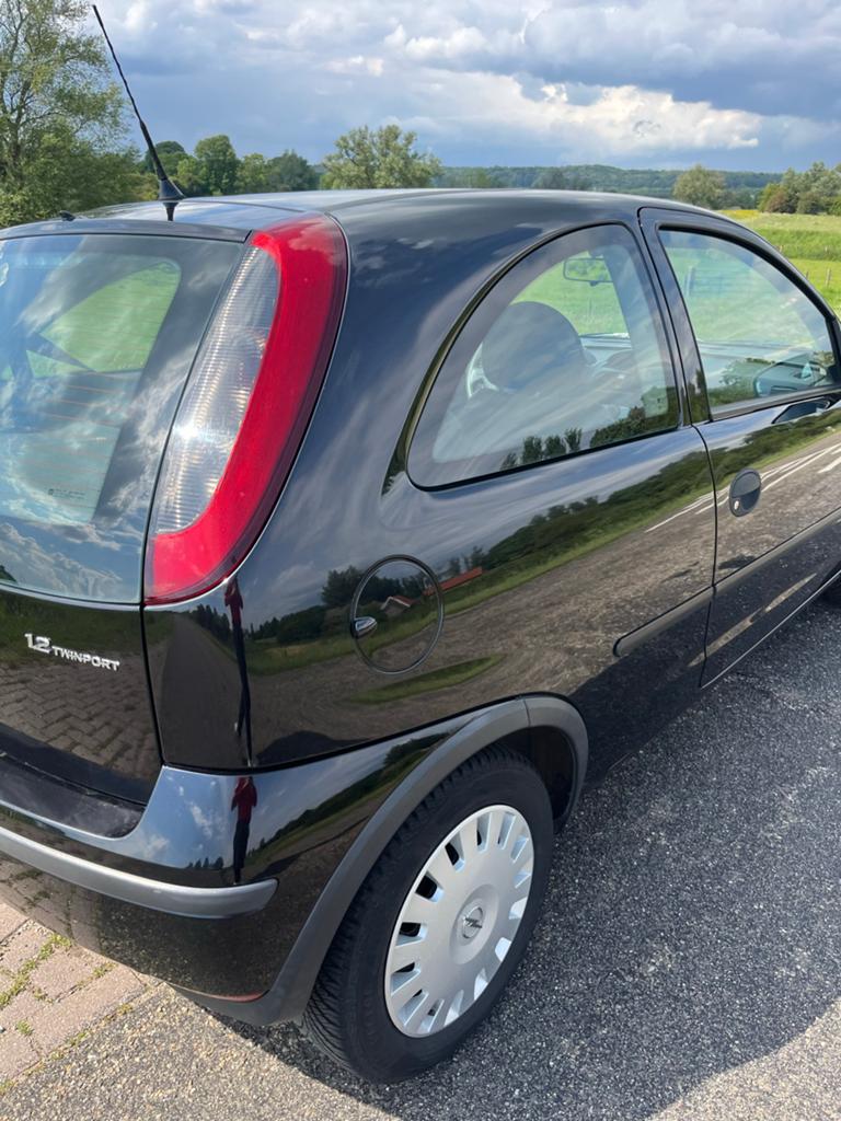 Opel Corsa 1.2 16V Twinport 3D 2005 Zwart, Auto's, Opel, Voorwielaandrijving, 450 kg, 31 €/maand, 4 cilinders