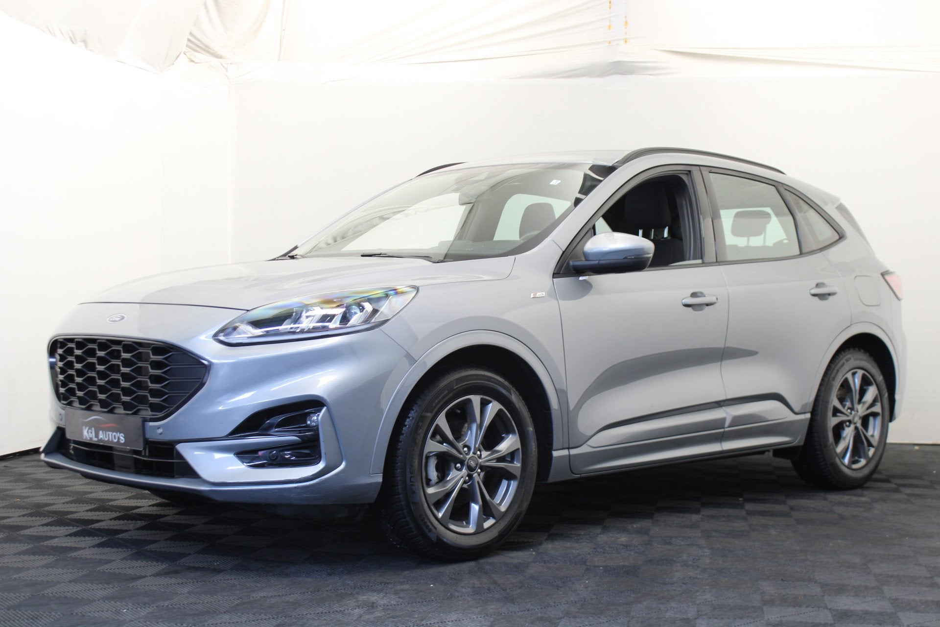 Ford Kuga 2.5 FHEV ST-Line (bj 2022, automaat), Auto's, Stof, Gebruikt, 4 cilinders, Overige brandstoffen