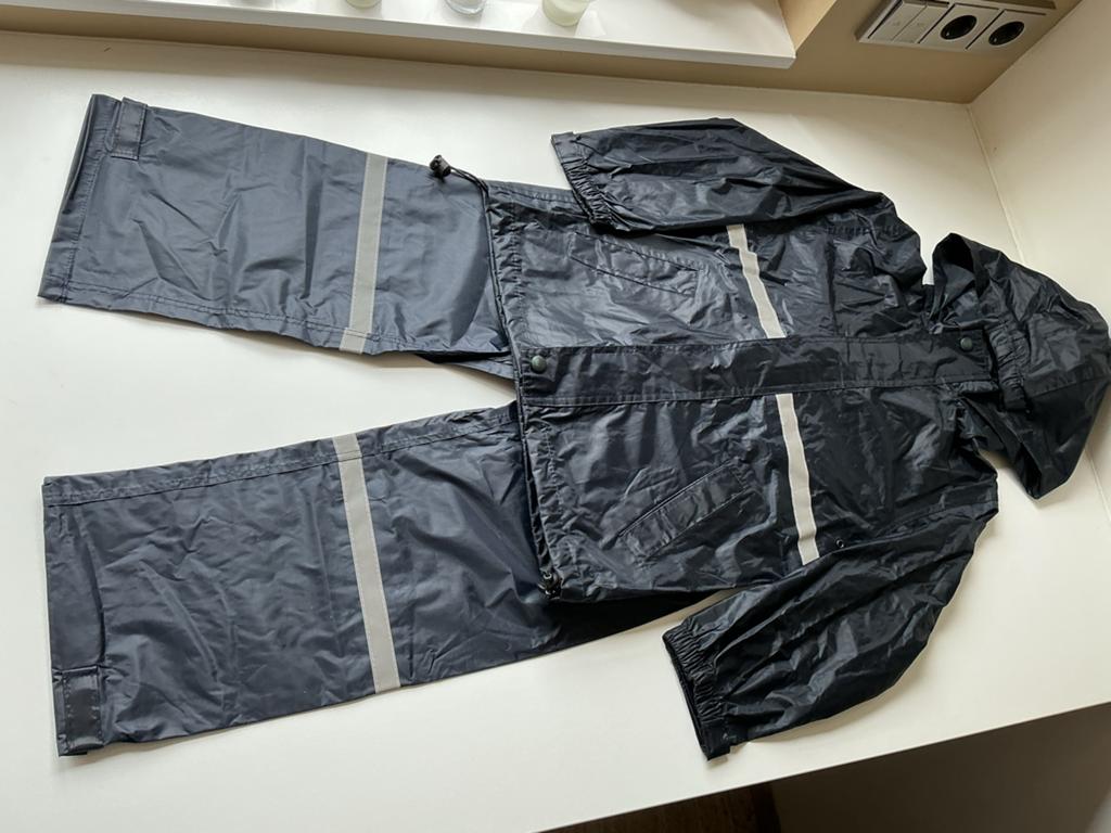 Hema regenpak donkerblauw maat 122/128, Caravans en Kamperen, Ophalen of Verzenden, Zo goed als nieuw, Regenpak, Kinderen