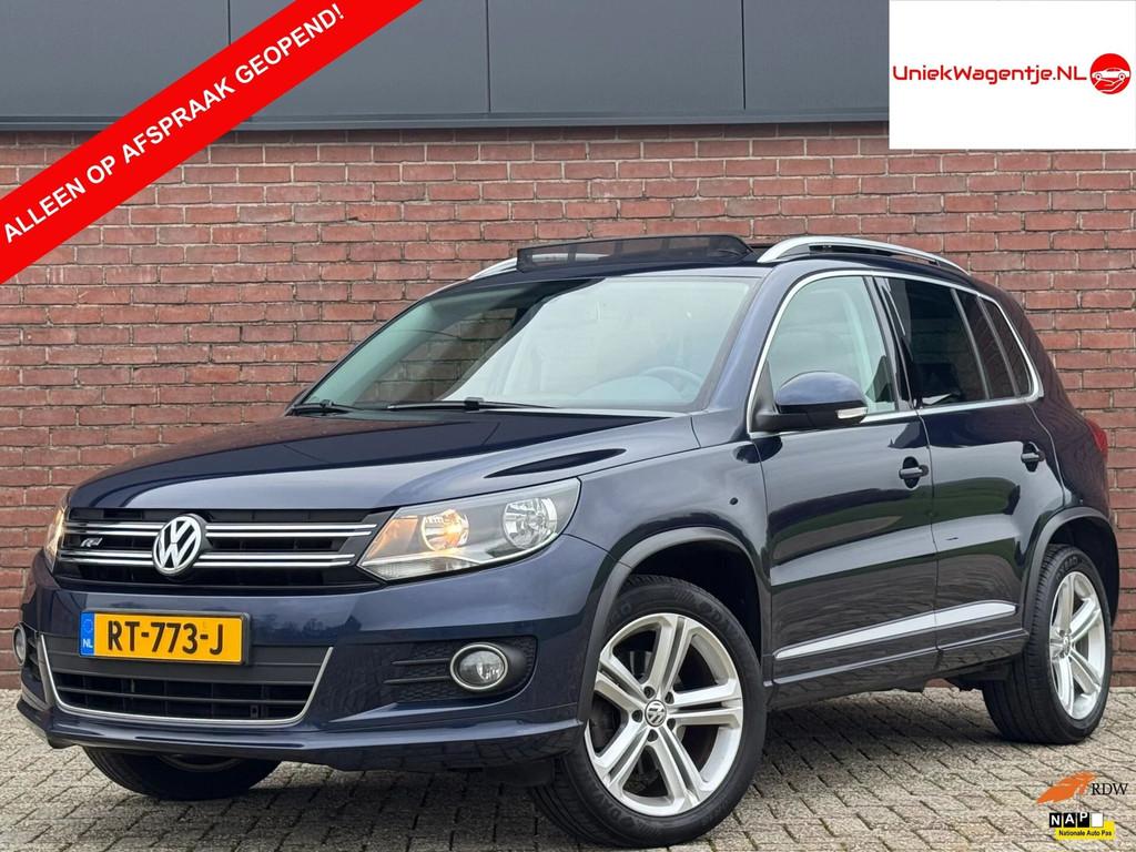 Volkswagen Tiguan 1.4 TSI R-LINE | PANODAK! | LEDER! | NAVI!, Auto's, Voorwielaandrijving, Gebruikt, 4 cilinders, Blauw