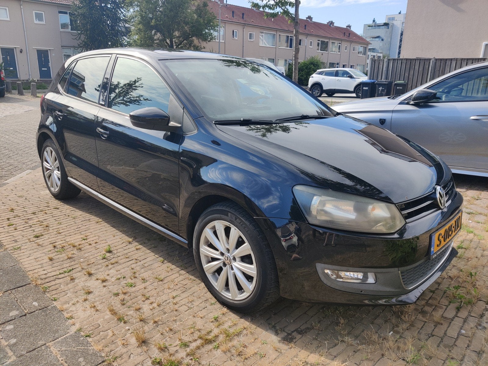 Volkswagen Polo 1.4 16V MPI 63KW 2011, Auto's, Voorwielaandrijving, 40 €/maand, Zwart, 4 cilinders