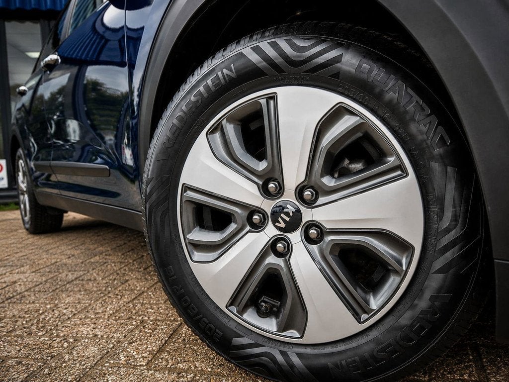 Kia Niro 1.6 GDi HEV DynamicLine Lane Assist Multimedia Lede, Auto's, Kia, Euro 6, Blauw, Leder en Stof, Origineel Nederlands