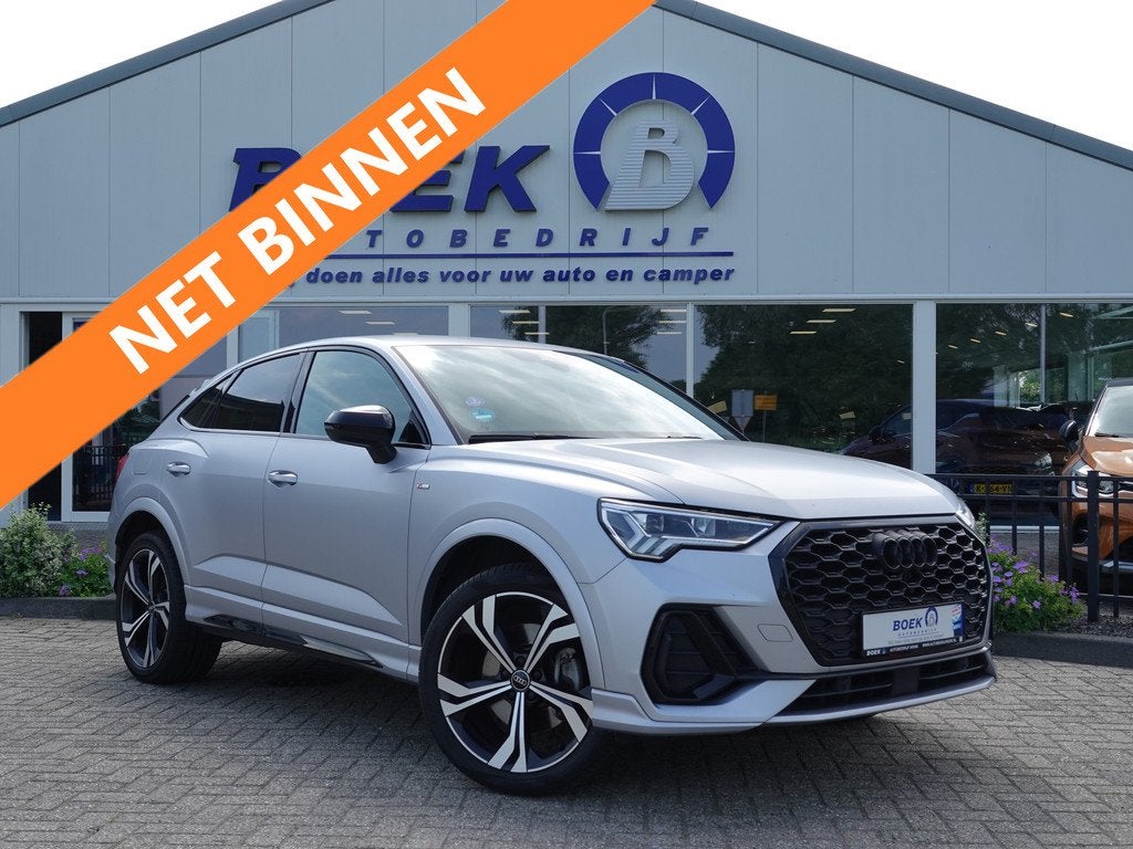 Audi Q3 Sportback 45 TFSI e 245PK S-LINE LEER | NAVI | DODE, Gebruikt, Hybride Elektrisch/Benzine, SUV of Terreinwagen, Automatische klimaatregeling