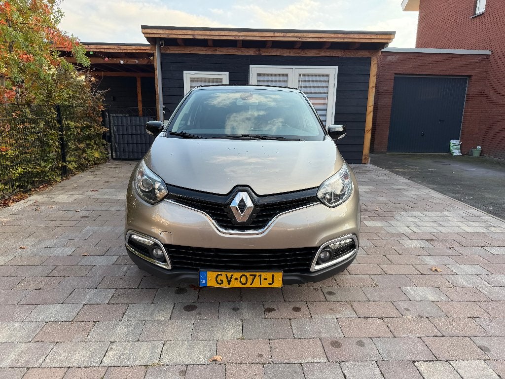 Renault Captur 1.2 TCE 120 EDC 2015 Bruin Automaat, Auto's, Stof, 625 kg, Euro 6, 4 cilinders