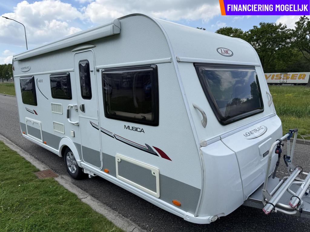 LMC MUNSTERLAND MUSICA 490 E MOVER + LUIFEL + SCHOTEL + TV, Caravans en Kamperen, Caravans, Rondzit, 7 tot 8 meter, Bedrijf, Hordeur