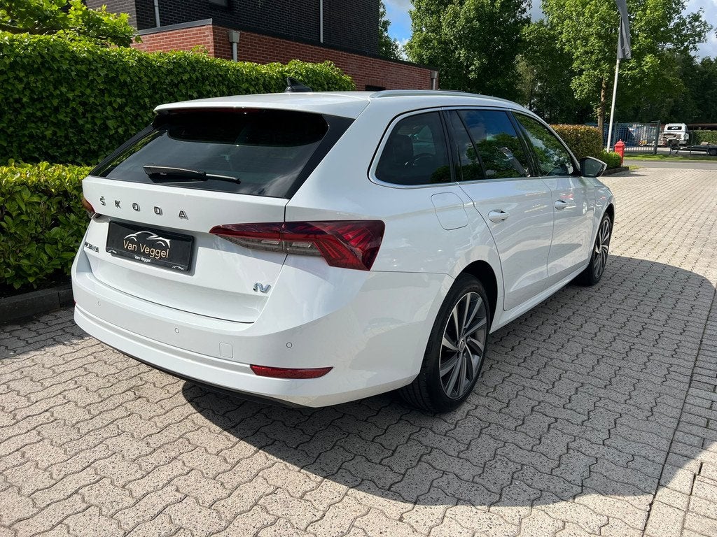 Skoda Octavia Combi 1.4 TSI iV PHEV Sportline Business pano,, Auto's, Skoda, Stof, Gebruikt, Wit, Hybride Elektrisch/Benzine