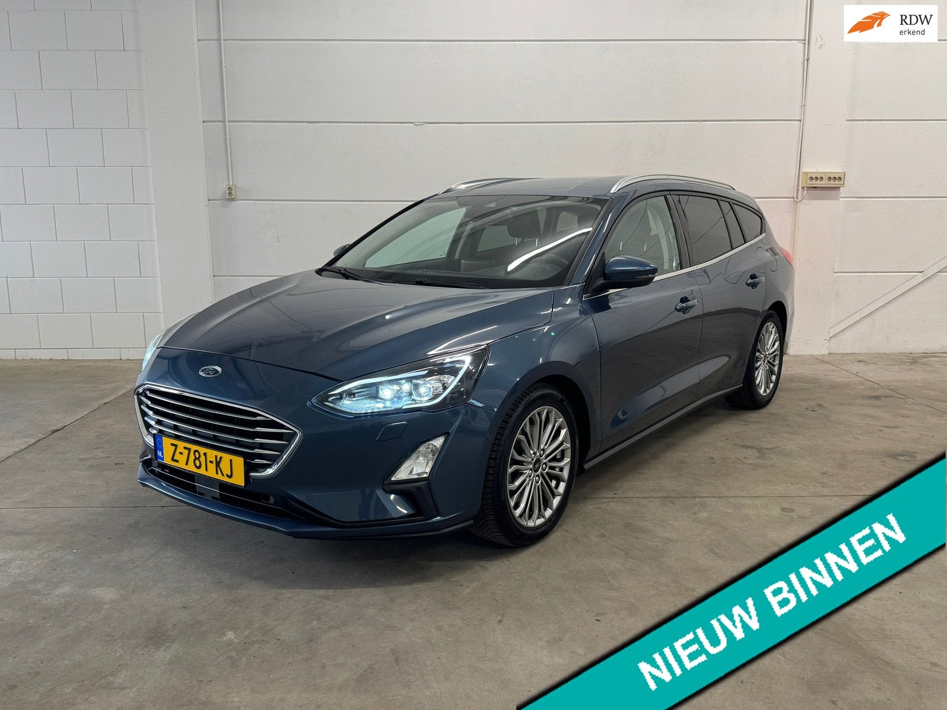 Ford Focus Wagon 1.0 EcoBoost Titanium Business Trekhaak, Lu, Dealer onderhouden, Gebruikt, 715 kg, Blauw