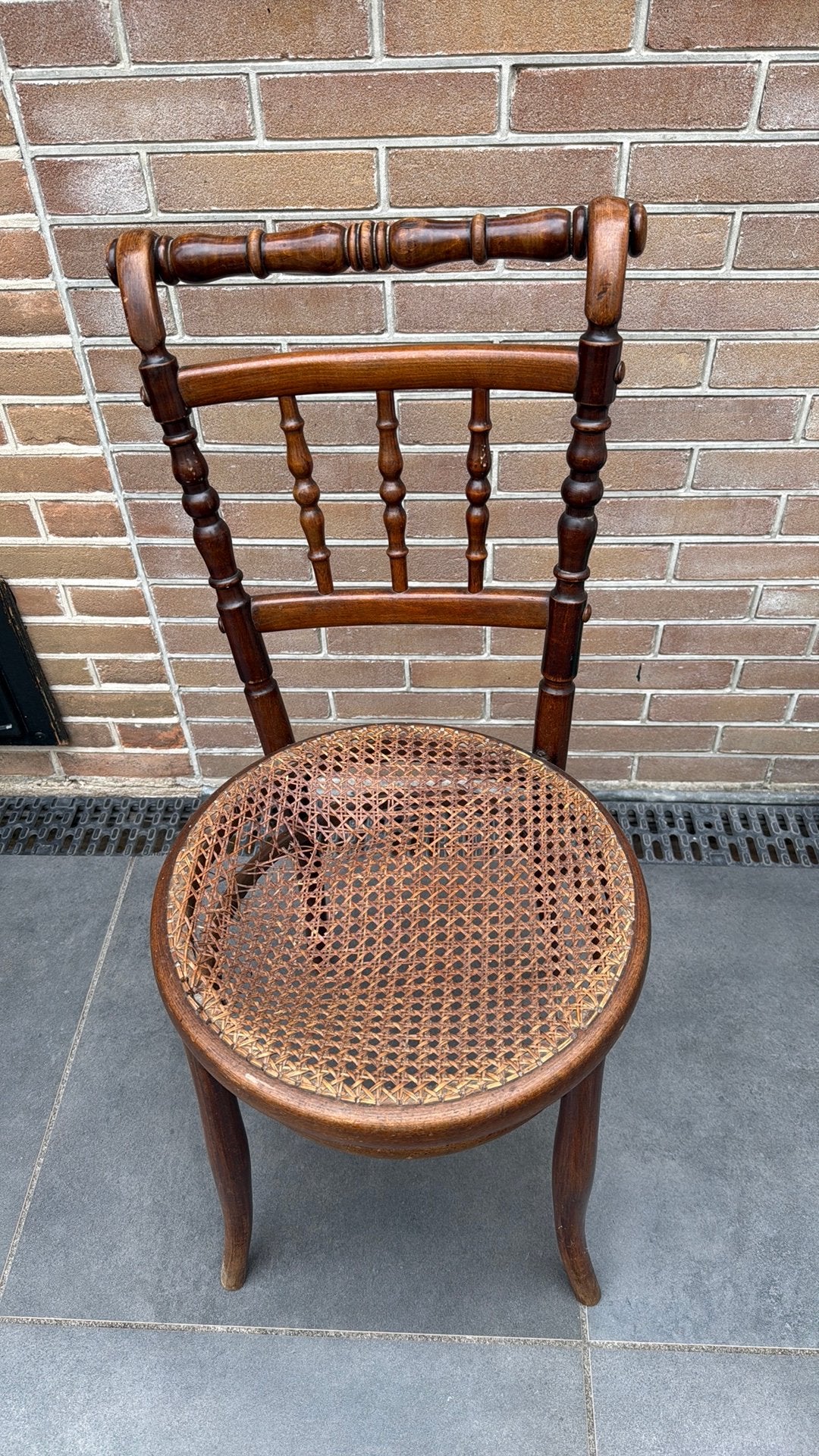 Antiek rotan stoeltje, Ophalen