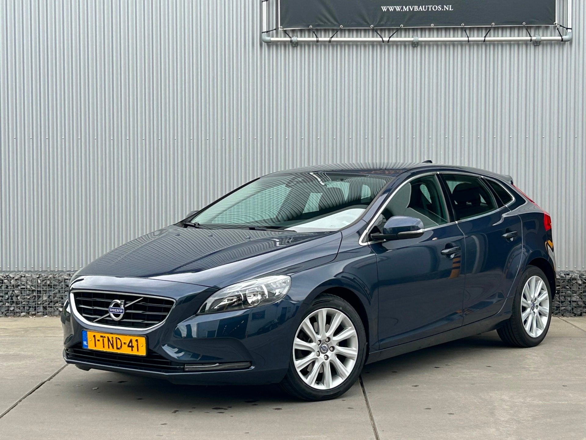 Volvo V40 1.6 T4 Momentum 179 PK Complete onderhoudshistorie, Auto's, Volvo, Gebruikt, 4 cilinders, Blauw, Leder en Stof