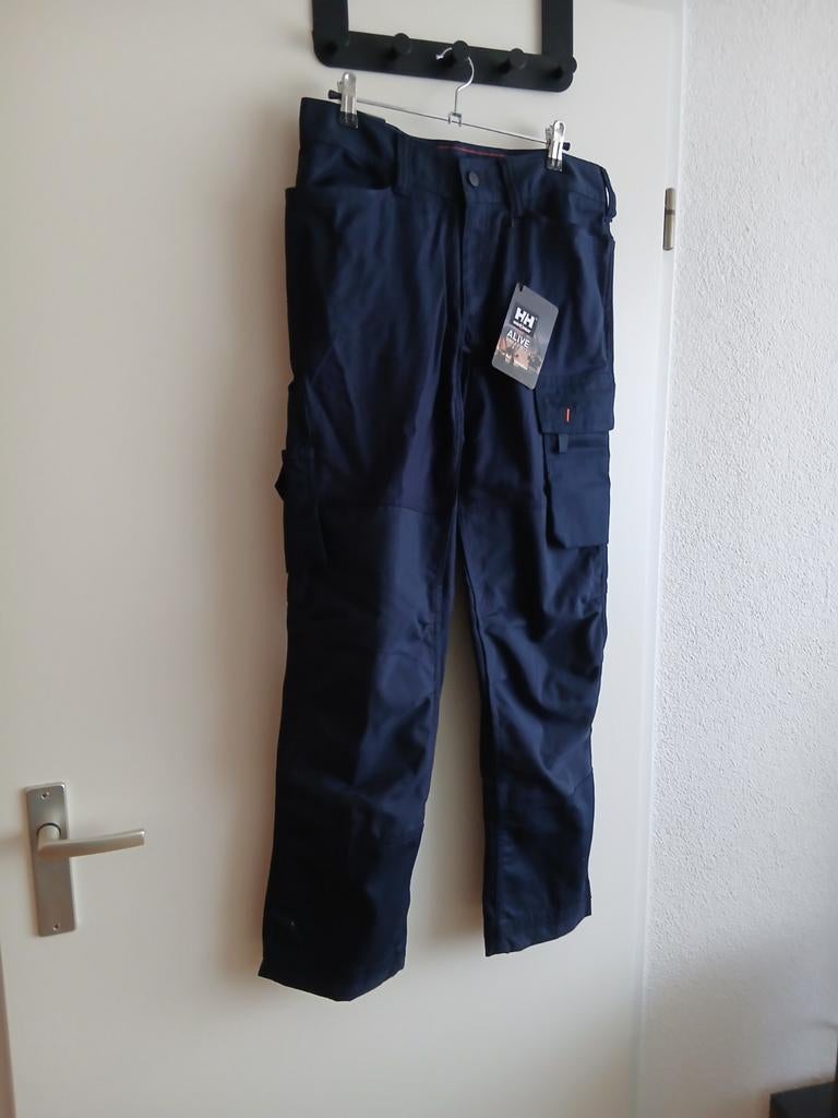 Blauwe werkbroek mét kaartjes van Helly Hansen. Maat C46., Tuin en Terras, Werkkleding, Helly Hansen, Nieuw, Broek, Heren