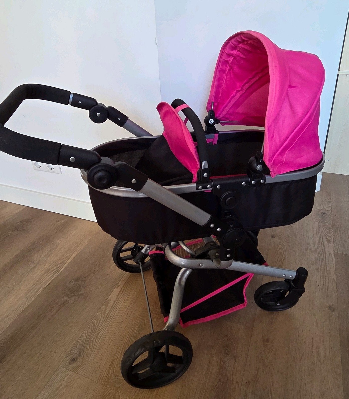 Bandits & Angels poppenwagen roze/zwart, Kinderen en Baby's, Speelgoed | Poppen, Ophalen of Verzenden