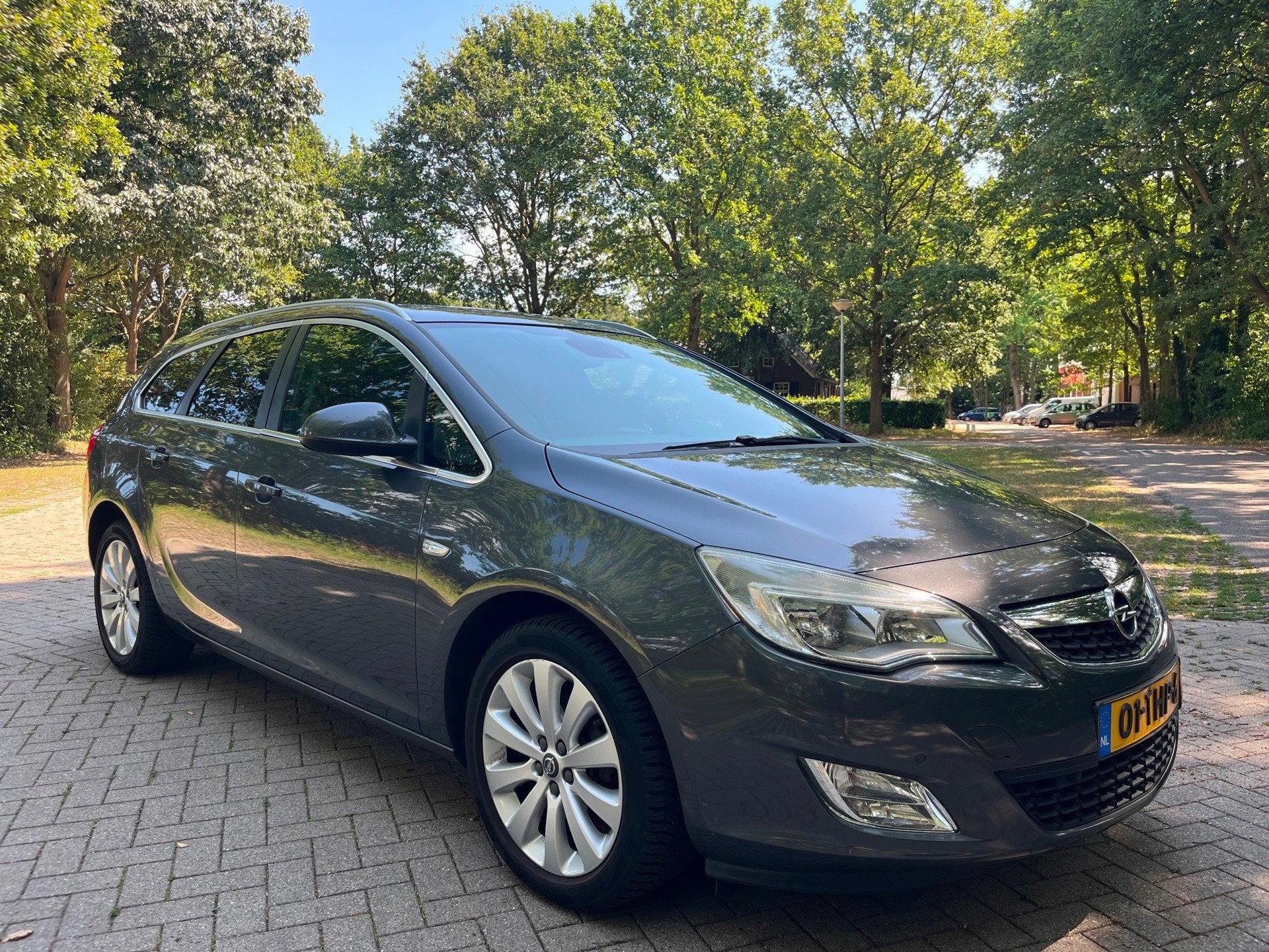 Opel Astra Sports Tourer 1.4 Turbo Cosmo 2012 NIEUWE APK, Auto's, Voorwielaandrijving, Euro 5, Gebruikt, 4 cilinders