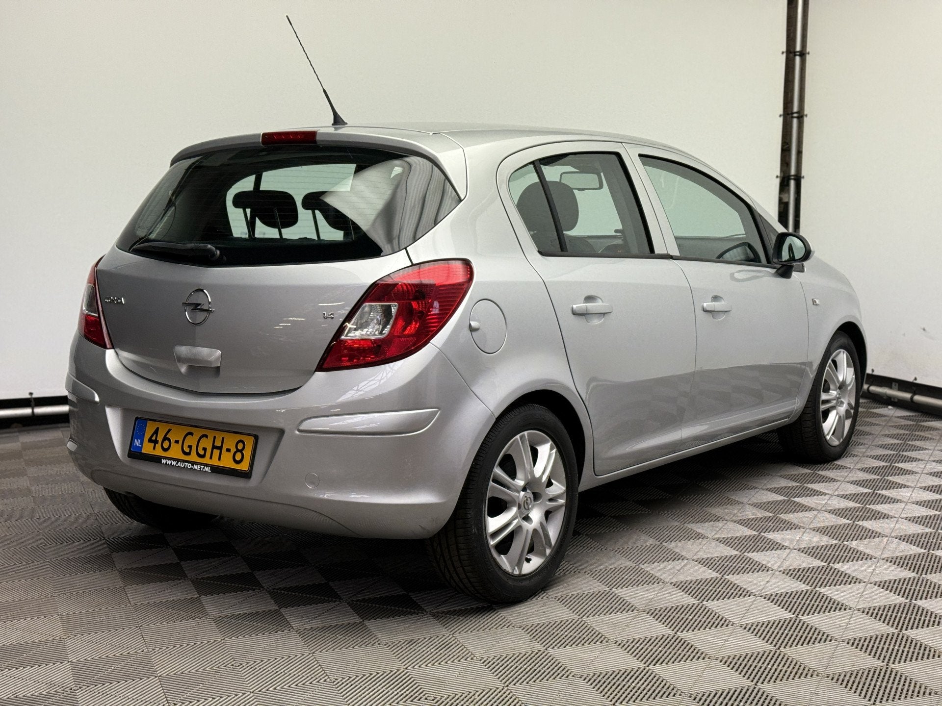 Opel Corsa 1.4-16V Enjoy 5-drs Airco LM16" NL Auto, Auto's, Voorwielaandrijving, Gebruikt, 4 cilinders, Met garantie (alle)