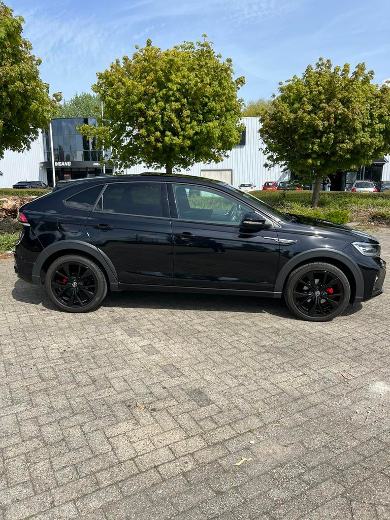 Volkswagen Taigo 1.5 TSI 3x R-line DSG PANO IQ CAMERA, Auto's, Lichtsensor, 1498 cc, 4 cilinders, Zwart
