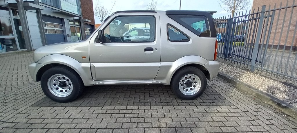 Suzuki Jimny 1.3 HardTop Cabrio 4WD 2001 Beige 123.595km, Auto's, Suzuki, Stof, 4 cilinders, 4 stoelen, Beige