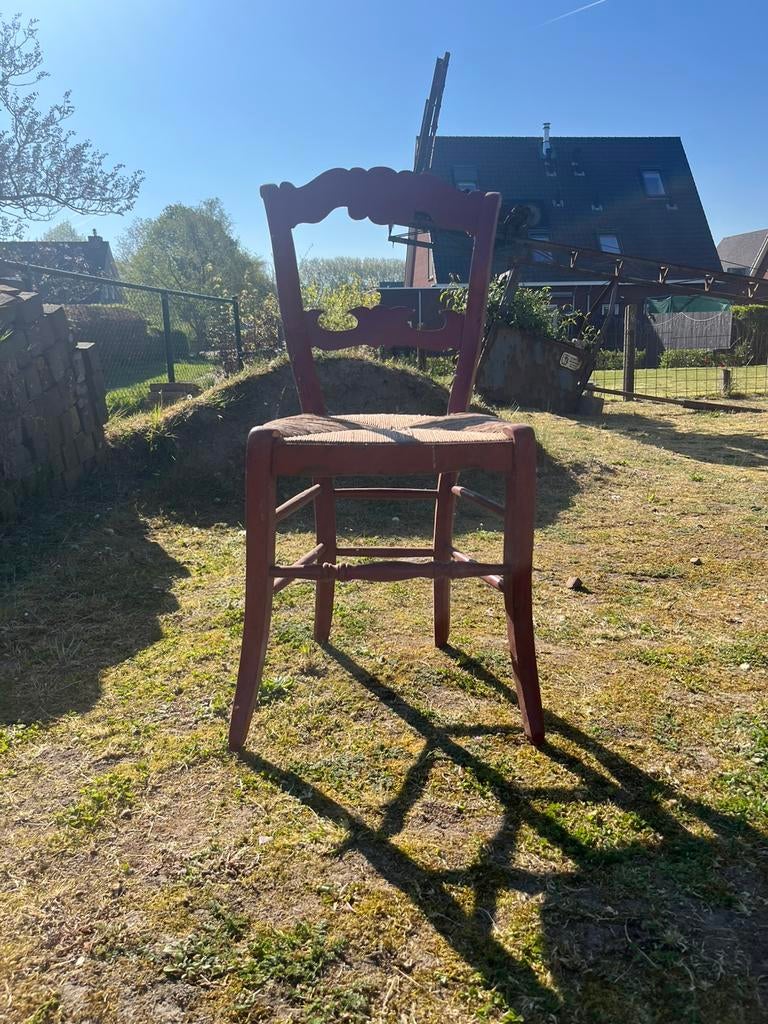 Antieke rode stoel, Ophalen