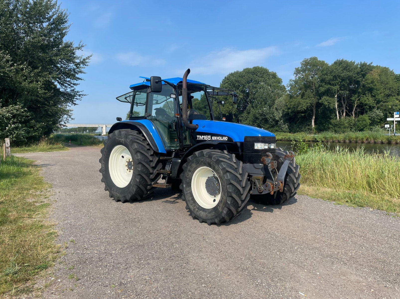 New holland tm 165, Zakelijke goederen, Agrarisch | Tractoren, Ophalen, Gebruikt, Meer dan 160 Pk, New Holland