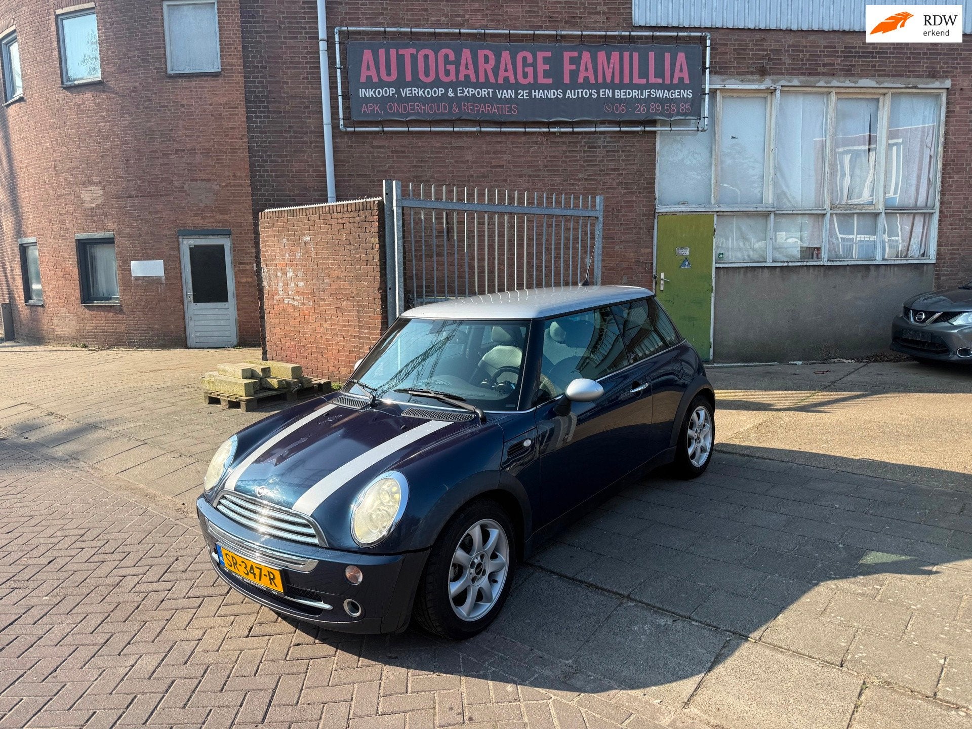Mini Mini 1.6 Cooper MET NIEUW APK, Voorwielaandrijving, Gebruikt, Zwart, 4 cilinders
