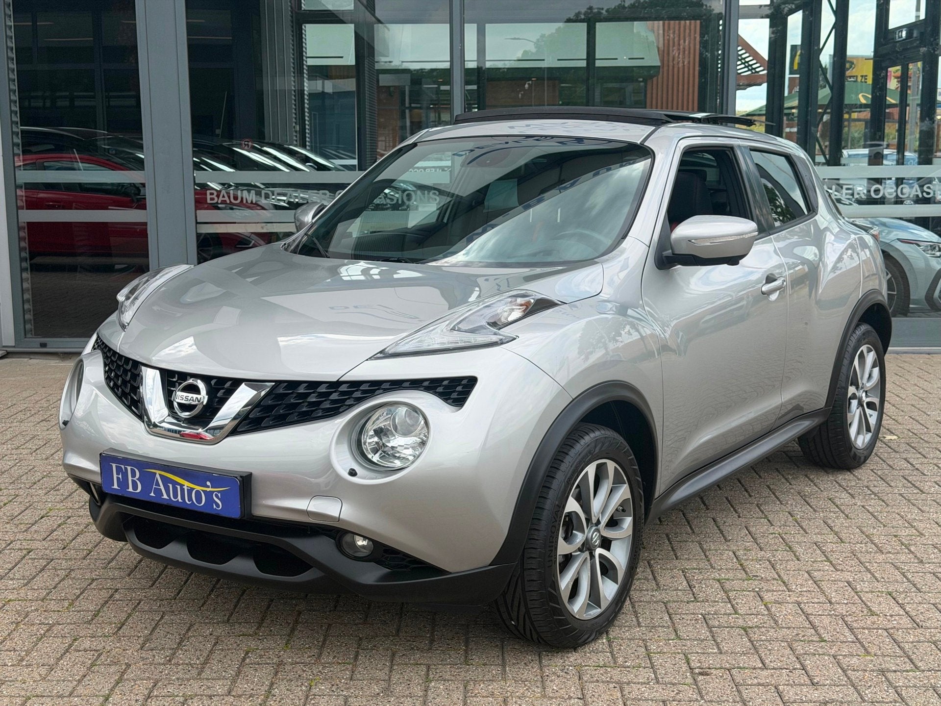 Nissan Juke 1.2 DIG-T S/S Tekna Airco Lmv Cruise Navi Camera, Auto's, Nissan, Voorwielaandrijving, Gebruikt, Zwart, 116 pk