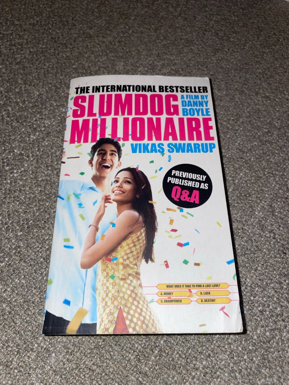 Slumdog Millionaire - Het boek achter de film, Ophalen of Verzenden, Gelezen, Wereld overig