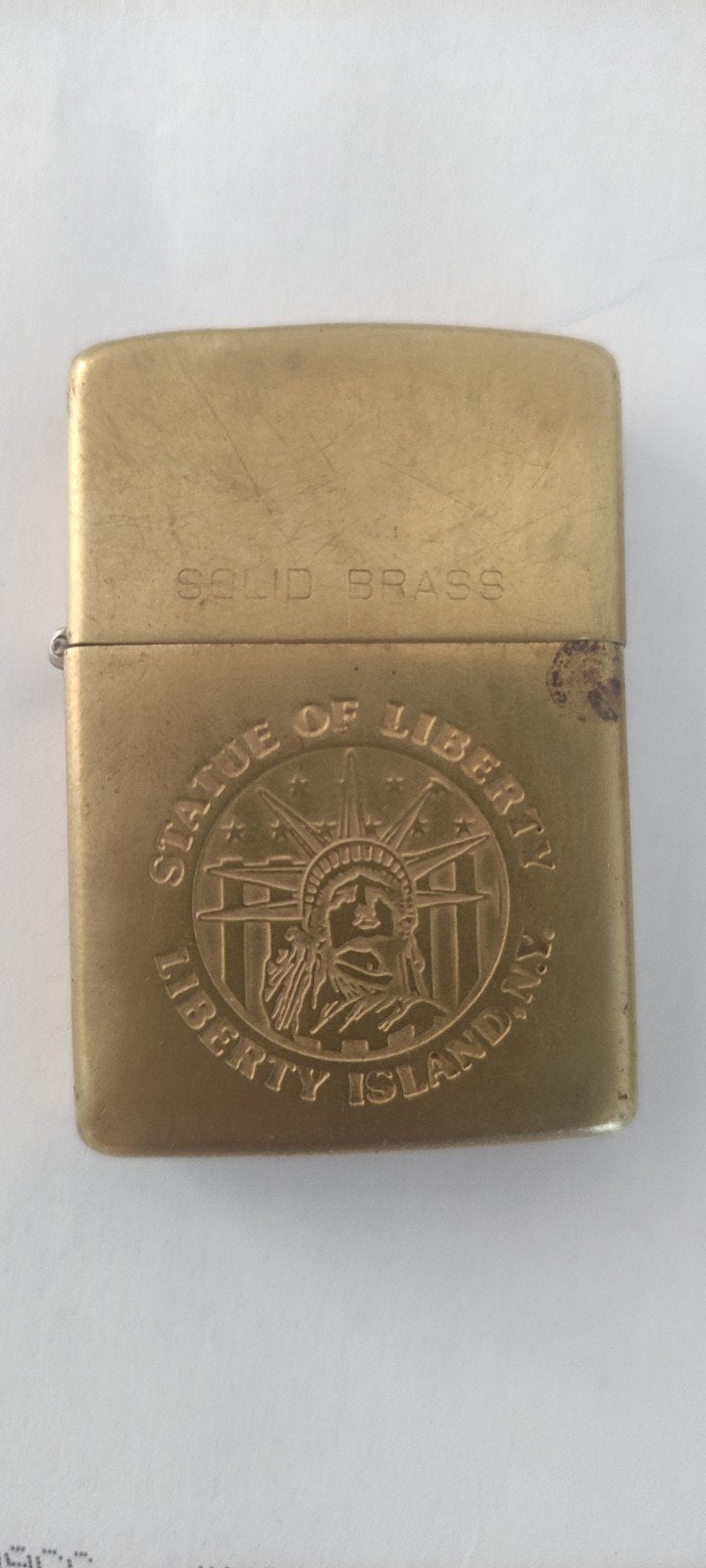 Vintage Zippo aansteker - Solid Brass - Vrijheidsbeeld, Ophalen of Verzenden, Gebruikt, Aansteker