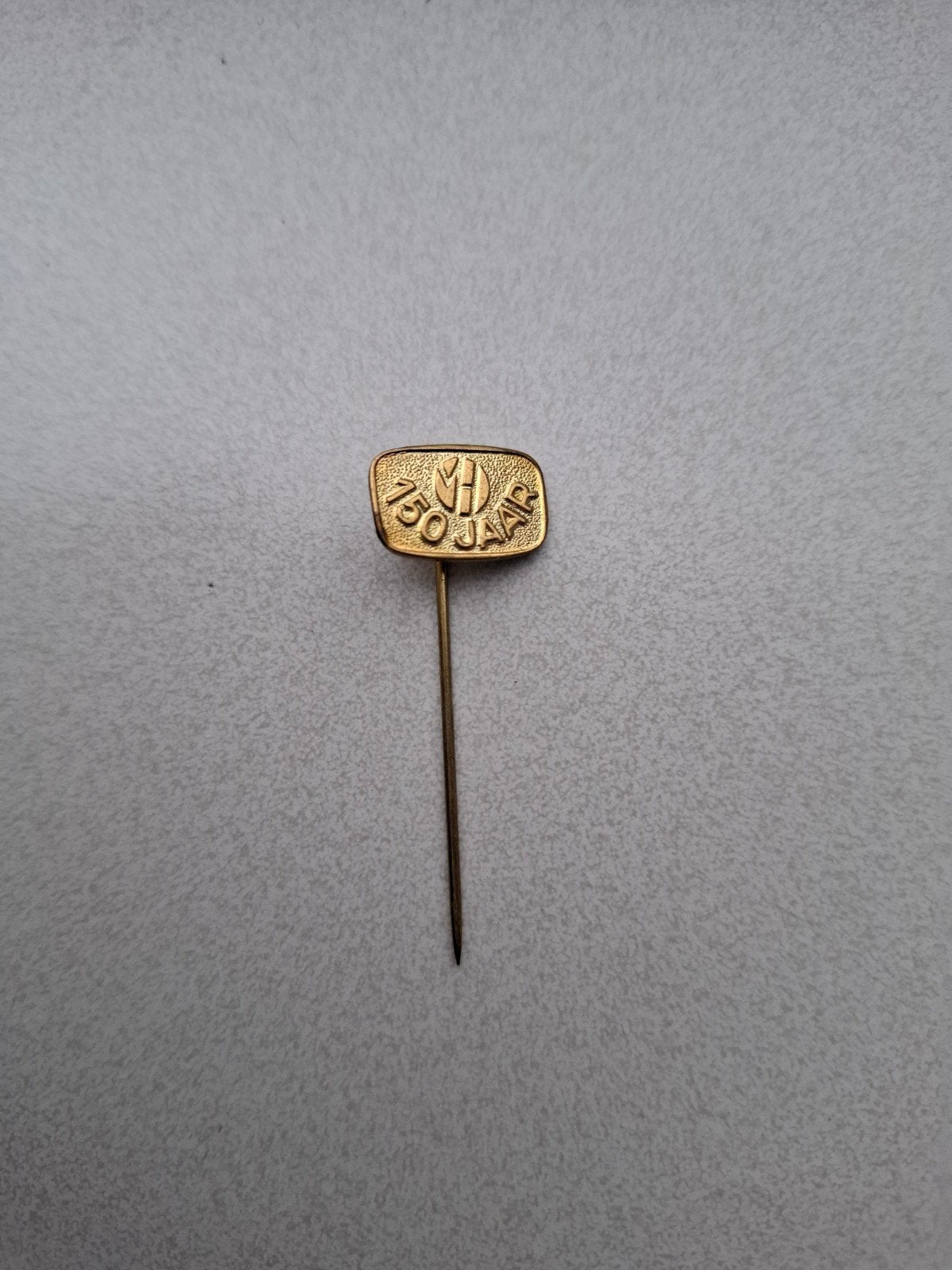 Vintage speldje pin prikker steekspeld Van Houten, Ophalen of Verzenden