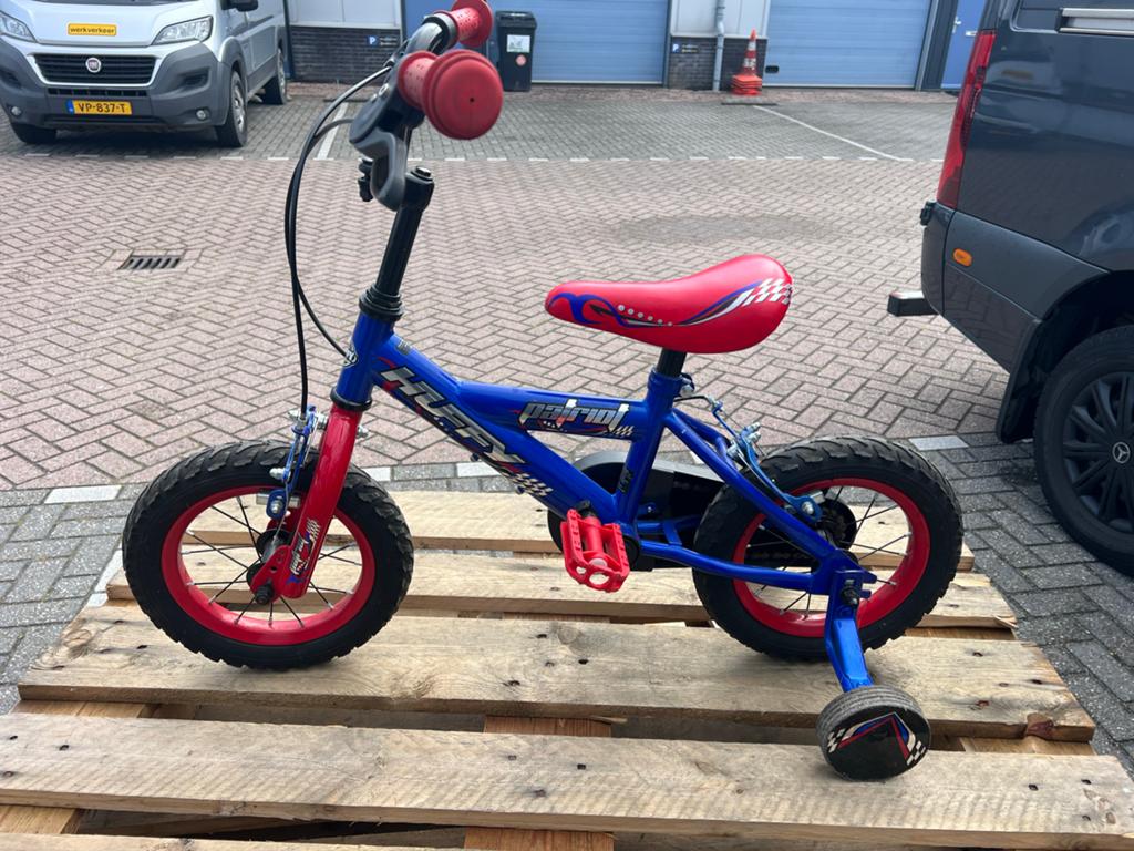 Huffy Patriot Kinderfiets 12 inch met zijwieltjes, Ophalen, Terugtraprem, Zijwieltjes, Gebruikt