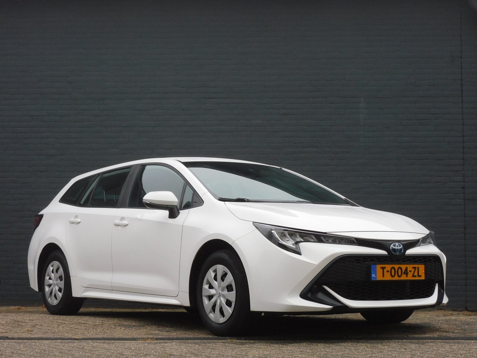 Toyota Corolla Touring Sports 1.8 Hybrid Comfort 1e EIGENAAR, Auto's, Gebruikt, 4 cilinders, Corolla, Wit