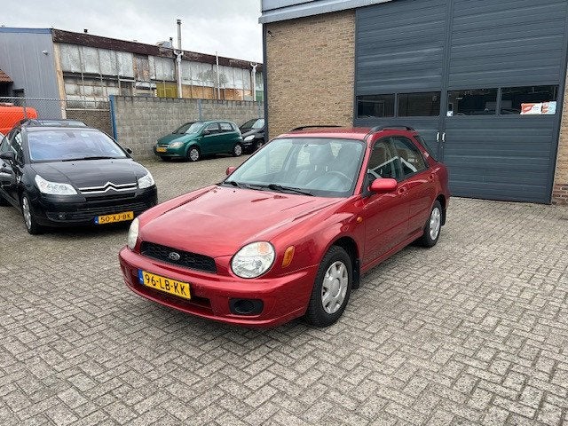 Subaru Impreza Plus 1.6 TS AWD, Auto's, Subaru, Gebruikt, Zwart, Handgeschakeld, Vierwielaandrijving
