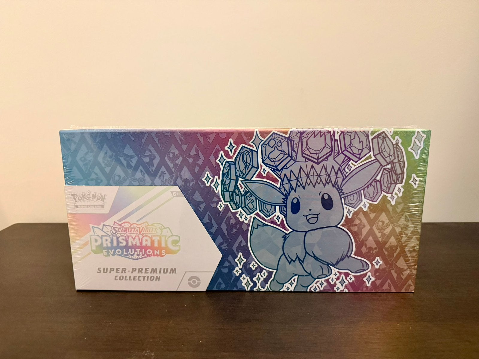 Pokémon Prismatic Evolutions Super Premium Collection (SPC), Ophalen of Verzenden, Nieuw, Boosterbox, Foil
